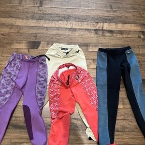 Four pairs of Kerrits equestrian performance riding tights